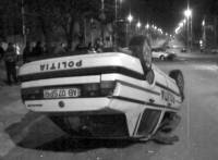 mașin poliției răsturnată